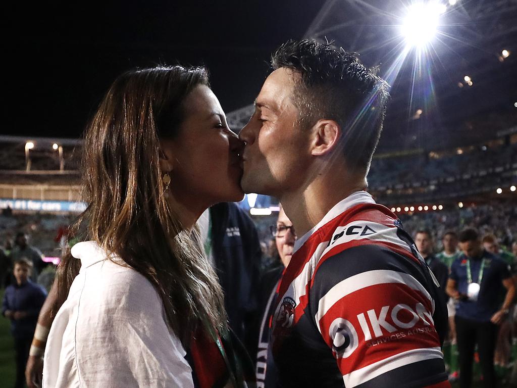 Cronk’s career sealed with a kiss with wife Tara Rushton.