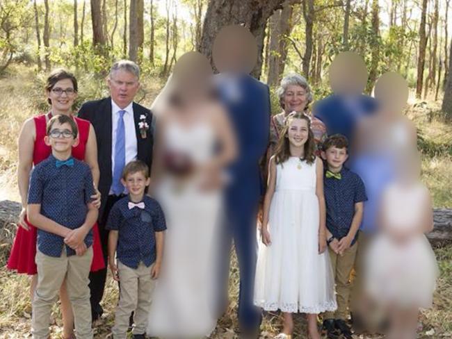 Katrina Miles and her kids in a family photo with Cynda and Peter Miles.