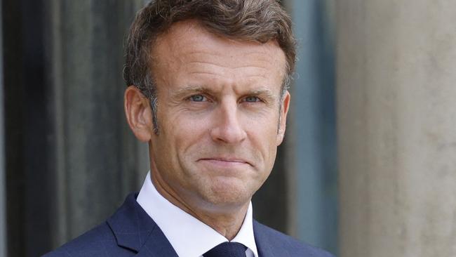 France's President Emmanuel Macron stands as he waits prior to the arrival of Slovenia's Prime Minister for their joint press conference at the presidential Elysee Palace in Paris on September 1, 2022. (Photo by Ludovic MARIN / AFP)