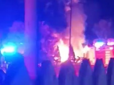 A caravan on fire after a massive explosion in Caboolture. Picture: Supplied