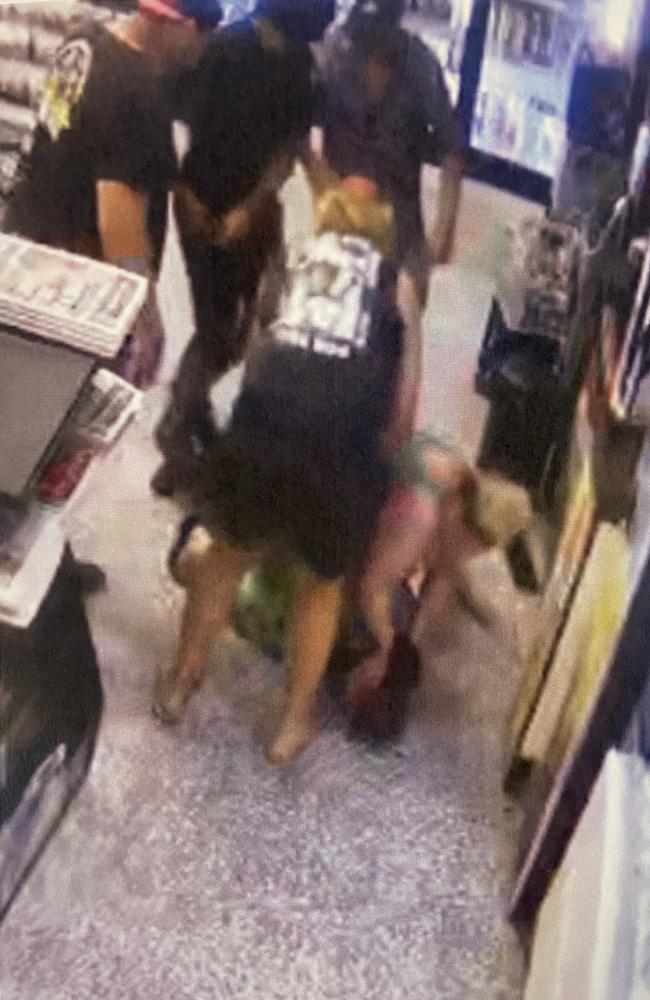 CCTV cameras captured customers tackling and restraining an alleged armed robber at Liberty Cannonvale on December 12, 2021. Picture: Supplied