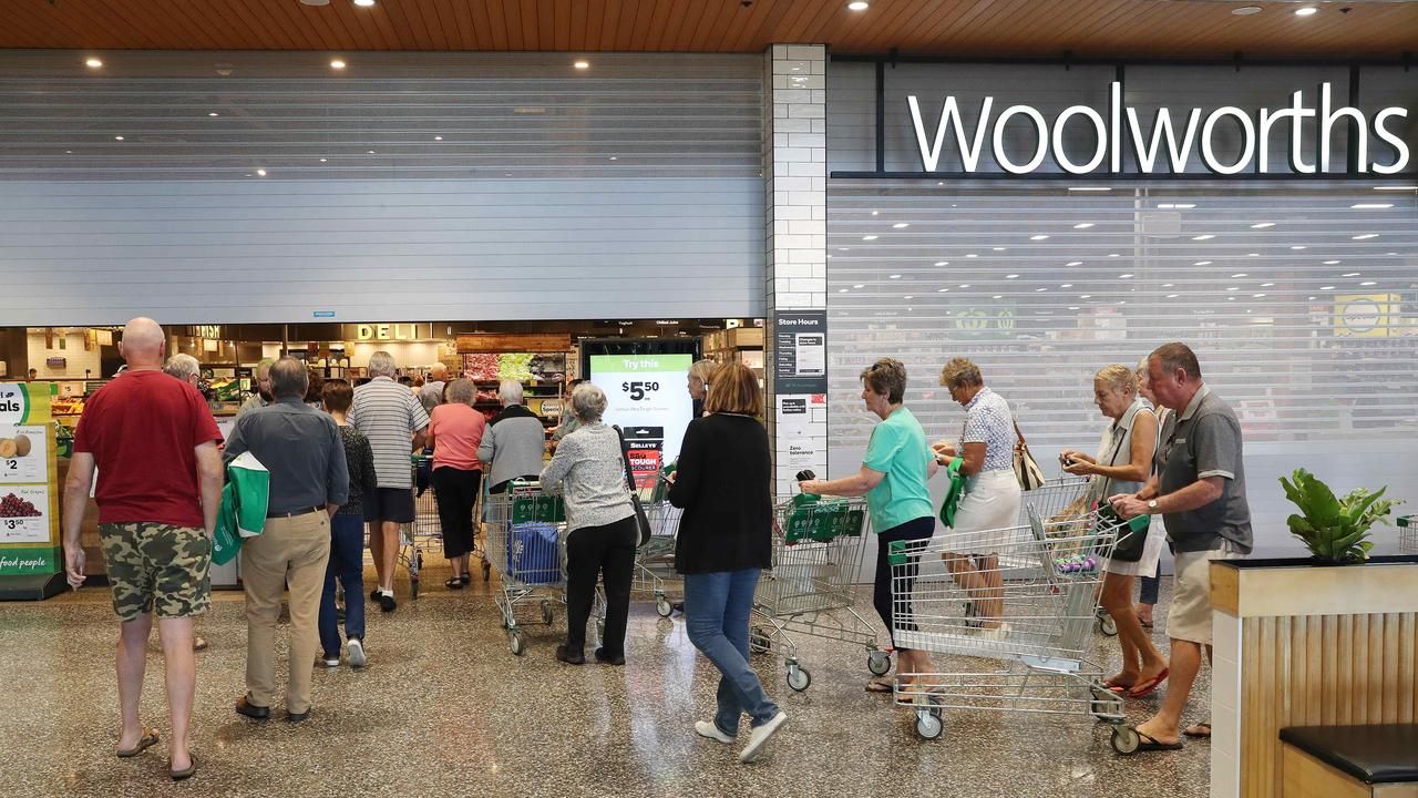 Early morning older shoppers arrive at a Woolworths in Brisbane. Picture: Liam Kidston