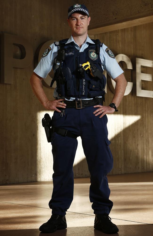 The policeman asked what. Костюм policeman Australia. Police Officers Vest. Испанский полисмен. Police body Vest.