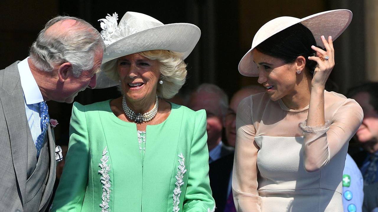 Prince Charles, Camilla, Duchess of Cornwall and Meghan, Duchess of Sussex at his 70th birthday in 2018. Picture: AFP PHOTO / POOL / Dominic Lipinski.