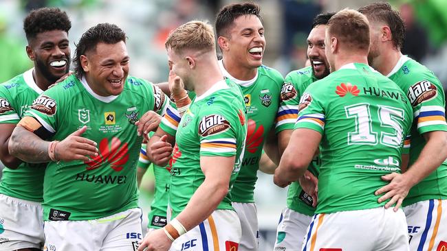 CANBERRA, AUSTRALIA - SEPTEMBER 20: Hudson Young of the Raiders celebrates with his team mates after scoring a try during the round 19 NRL match between the Canberra Raiders and the New Zealand Warriors at GIO Stadium on September 20, 2020 in Canberra, Australia. (Photo by Cameron Spencer/Getty Images)