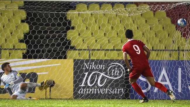 Omar Alsoma scores Syria’s controversial penalty. (Photo by Robert Cianflone/Getty Images)