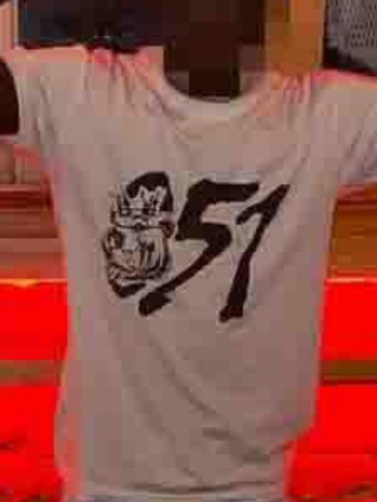 The 051 logo is printed on a t shirt.