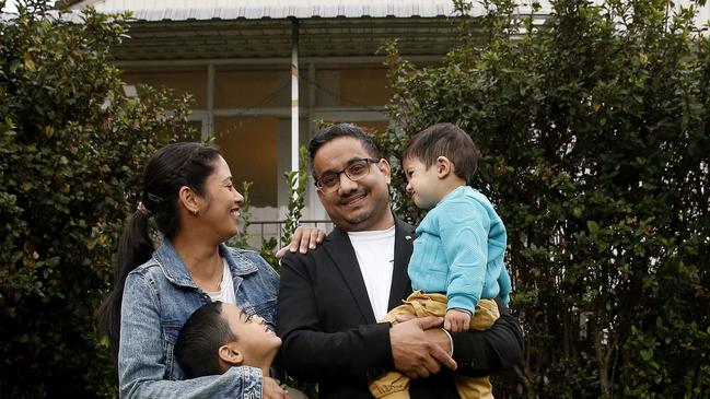 Property investor Lakhwinder Singh with his family. Picture: John Appleyard