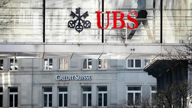 UBS will buy Credit Suisse. The headquarters of the two Swiss giants are across the road from each other in Zurich. (Photo by Fabrice COFFRINI / AFP)