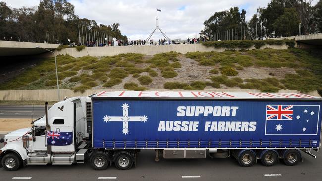 The Convoy of No Confidence passes in front of Parliament House in August 2011.