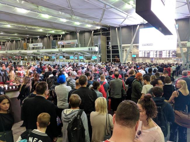 Chaos at check-in at Sydney Airport Terminal T2. Picture: Twitter @StephenSmiley