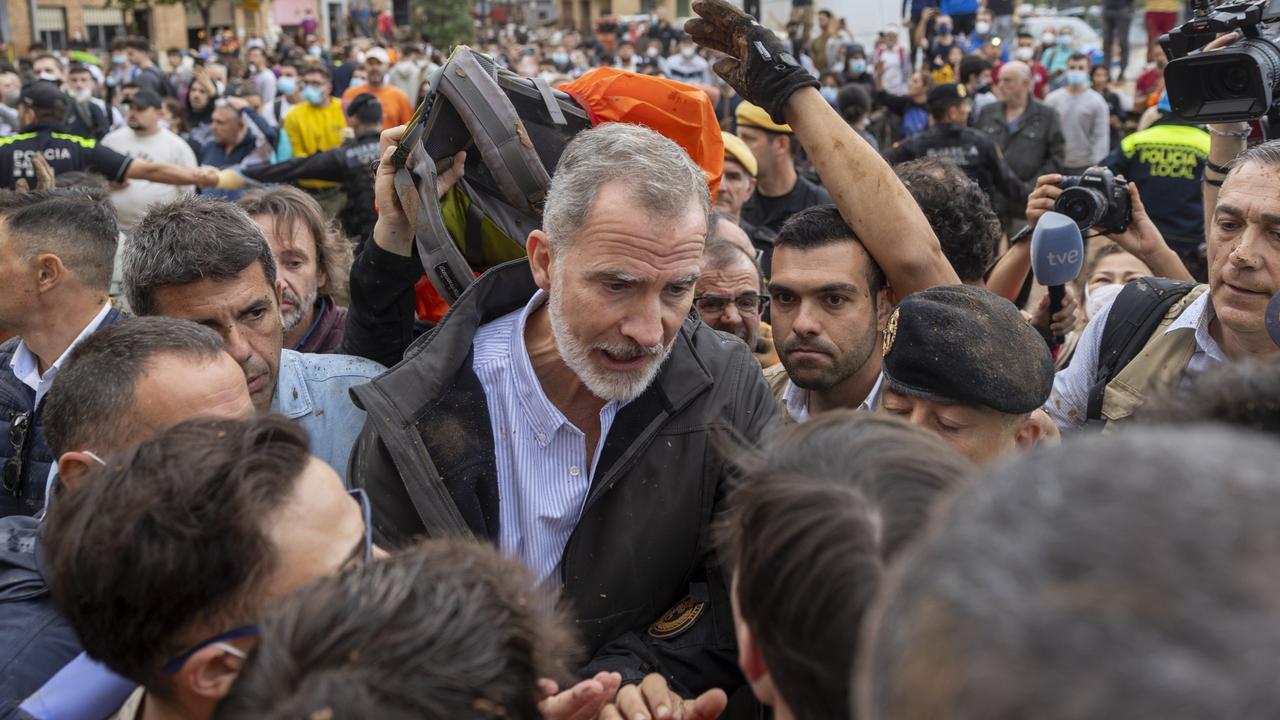 Spain's King Felipe VI had mud and insults hurled his way while trying to calm angry flood survivors in Paiporta, near Valencia on Sunday 3 November. Picture: AP Photo/David Melero