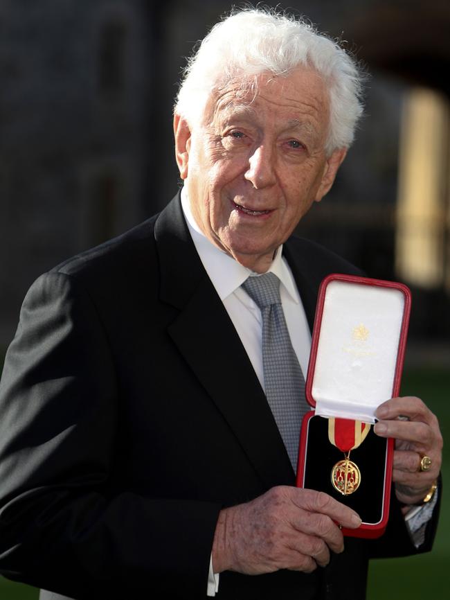 Australian-Israeli businessman Frank Lowy, chairman of the Westfield Corporation, poses with his medal after being created a Knights Bachelor (Knighthood). Picture: AFP