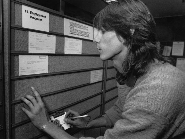 Nick Allan, 24, searches for a job at the Commonwealth Employment Service (CES) office in Adelaide, January 1992. Picture: The Advertiser