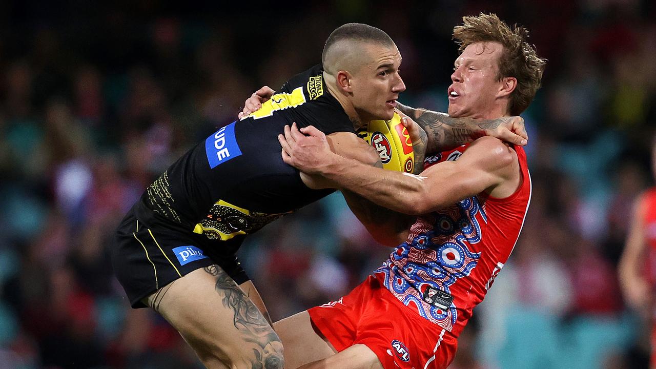 Callum Mills never shirks a challenge, not even from Richmond superstar Dustin Martin. Picture: Phil Hillyard