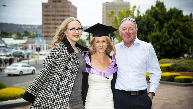 Katelyn Walker (centre) with Elise Robinson and Rob Walker. University of Tasmania Graduations. Federation Concert Hall, Hobart. Picture: RICHARD JUPE