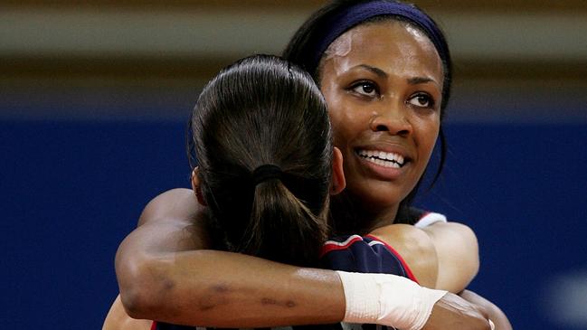 Kimberly Glass and Stacy Sykora celebrate making the Olympic final. Photo by Jeff Gross/Getty Images