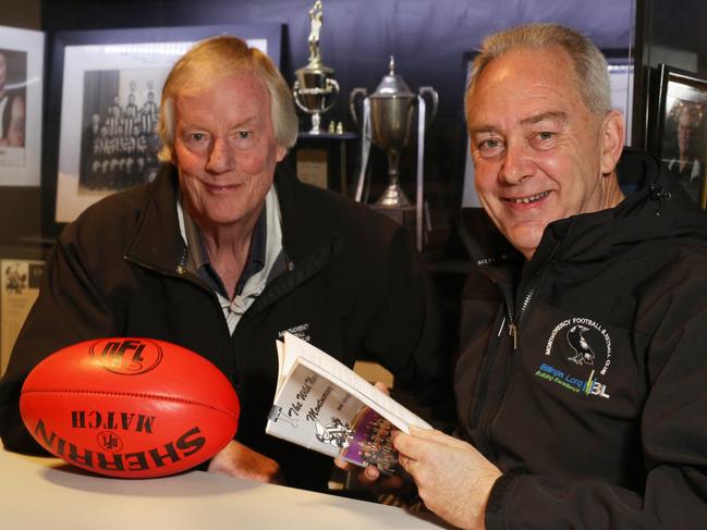 Lee Adamson (R) with the author of the Montmorency Football Club history. Picture: Stuart Milligan