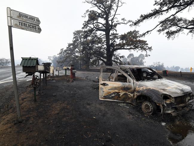 A burnt-out vehicle in Quaama in January. Picture: Saeed Kham/AFP