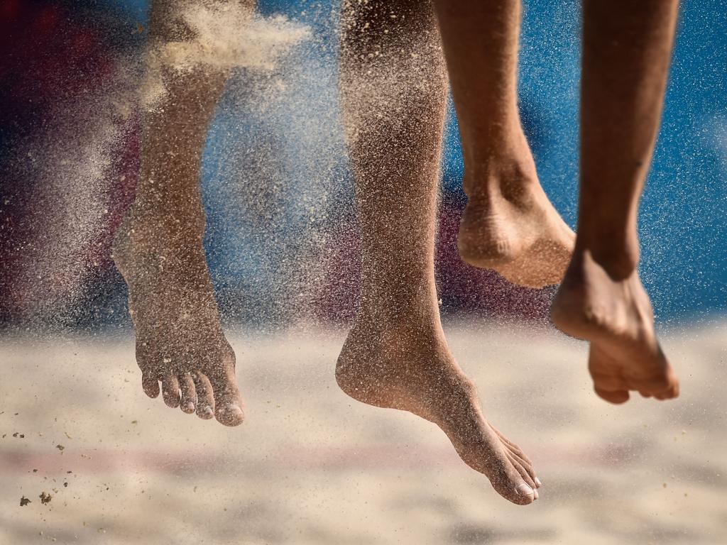 Austria’s Lorenz Peter Petutschnig (R) vies with Estonia’s Rivo Vesik during the men’s beach volleyball preliminary round pool G match Austria vs Estonia at the 2015 European Games in Baku on June 18, 2015. Picture: AFP