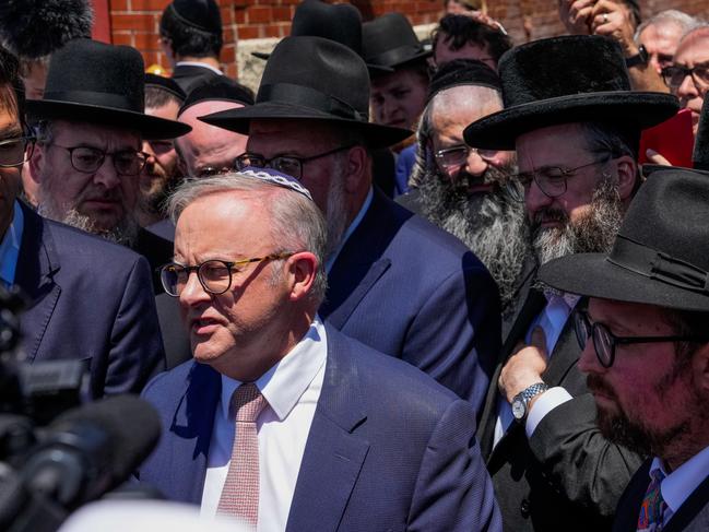 MELBOURNE, AUSTRALIA - DECEMBER 10: Australian Prime Minister Anthony Albanese speaks to the media after he visited the damaged Adass Israel Synagogue on December 10, 2024 in Melbourne, Australia. An arson attack on the Adass Israel Synagogue in Melbourne last week forced congregants to flee as flames engulfed the building early on Friday morning. Prime Minister Anthony Albanese condemned the incident as an antisemitic act, emphasizing that such violence at a place of worship is unacceptable in Australia and labelling the event an act of terrorism. (Photo by Asanka Ratnayake/Getty Images)