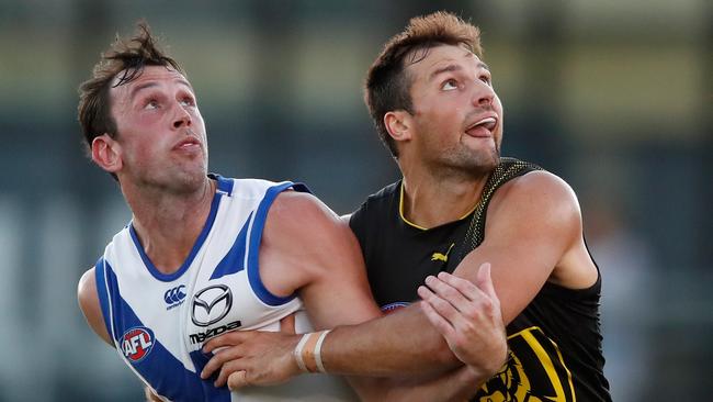 North Melbourne’s Todd Goldstein, left, and Tiger Toby Nankervis battle it out at a ruck contest during the JLT Series clash.