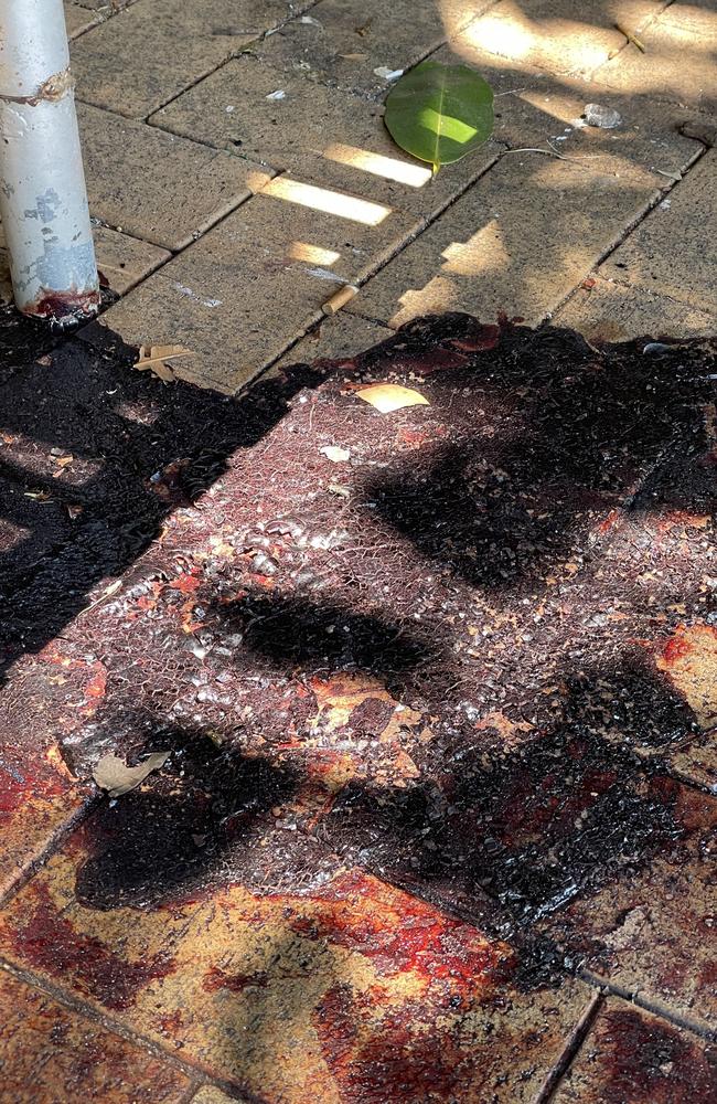 A huge pool of dried blood was left in Bennett Park in Darwin, between Parliament House and the Top End Tourist Information Centre, for at least 48 hours. Picture: Annabel Bowles