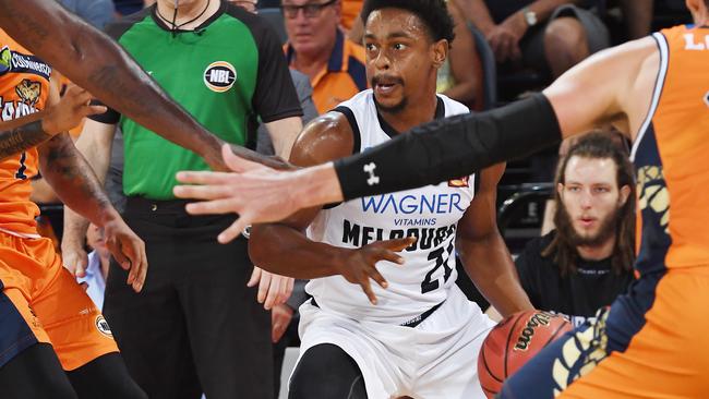 Casper Ware of United tries to find a way through the Taipans defence during the Round 4 NBL match between the Cairns Taipans and Melbourne United at the Cairns Convention Centre in Cairns, Saturday, November 3, 2018. (AAP Image/Brian Cassey) NO ARCHIVING, EDITORIAL USE ONLY