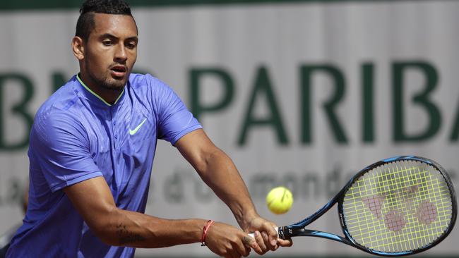 Nick Kyrgios returns the ball to Germany's Philipp Kohlschreiber.