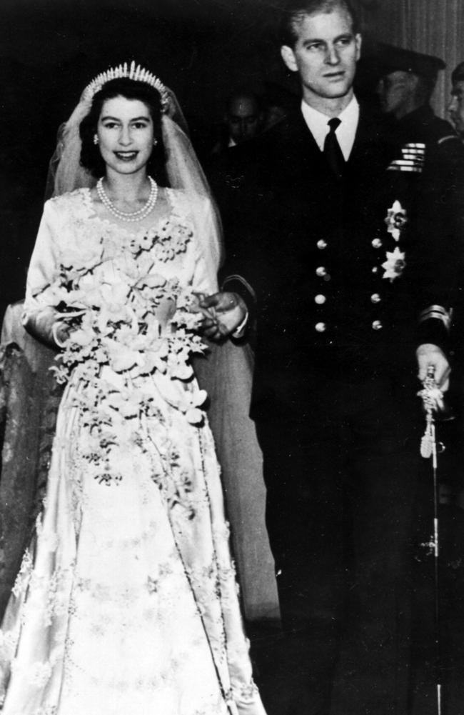 In this Nov. 20, 1947 file photo, Britain's Princess Elizabeth leaves Westminster Abbey in London, with her husband, the Duke of Edinburgh, after their wedding ceremony. Britain's Queen Elizabeth celebrates her 91st birthday on Friday, April 21, 2017. Picture: AP Photo/file