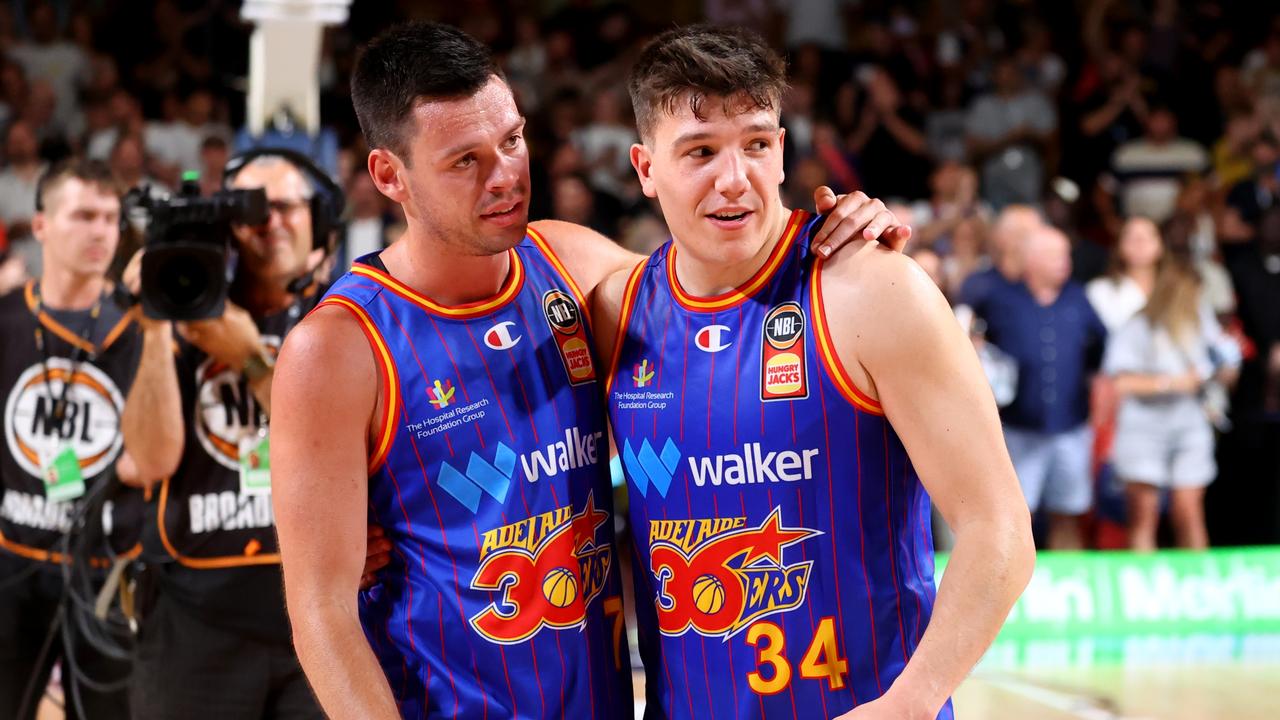 Jason Cadee and Dejan Vasiljevic of the 36ers celebrate their massive upset win over Melbourne United. Picture: Kelly Barnes/Getty Images.