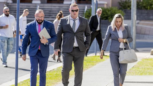 Steve Smith (black suit) walking into the Southport Courthouse. Picture: Jerad Williams.