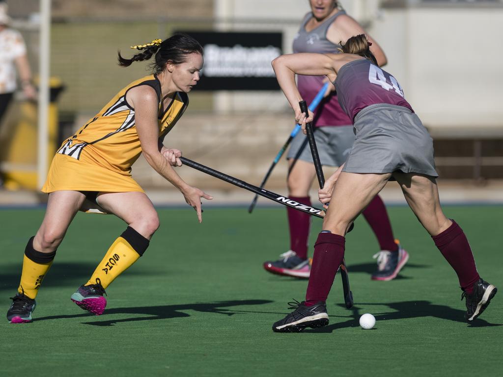 Jodie Columbine (left) of Sunshine Coast 2 against Gladstone 1.