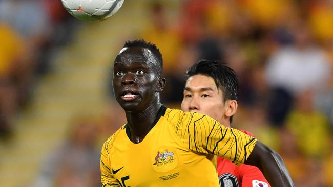 Awer Mabil (left) of the Socceroos in action during the International friendly match between Australia and the Korea Republic at Suncorp Stadium, in Brisbane, Saturday, November 17, 2018. (AAP Image/Darren England) NO ARCHIVING, EDITORIAL USE ONLY