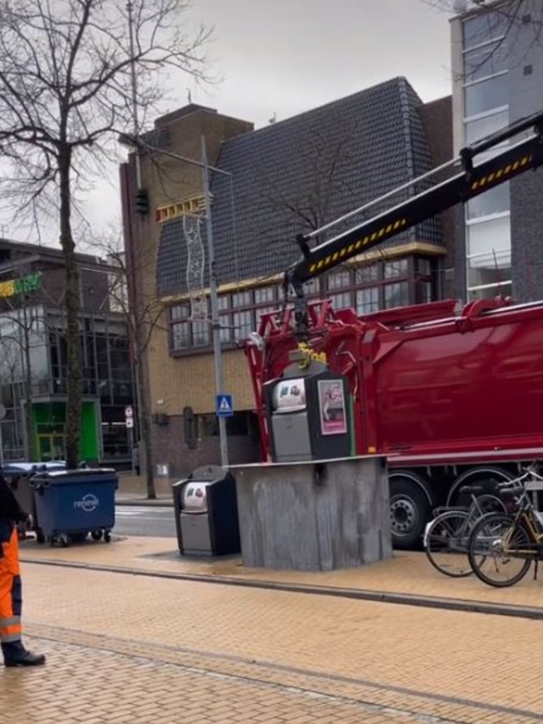 Only a small part of the bin can be seen above the ground. Picture: Donovan Woods/TikTok