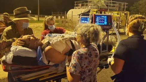 The RFDS medical team treats Karryn Dolan at Coen airstrip. Picture: supplied