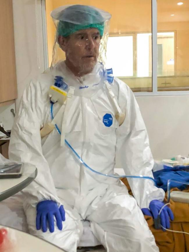 Photographer Graham Crouch is prepared by hospital staff at Siolam Hospital in Jakarta for an air ambulance flight to Australia. Picture: Amanda Hodge.