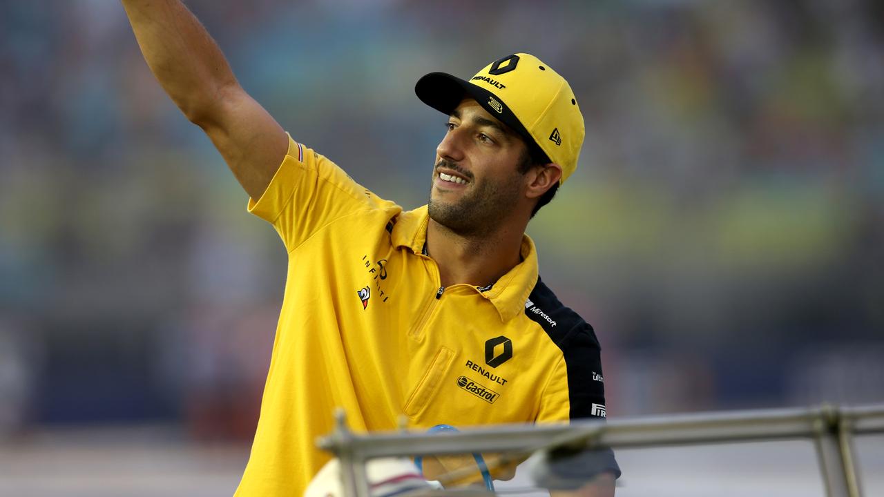 Daniel Ricciardo waves to the crowd on the drivers parade in Singapore last weekend.