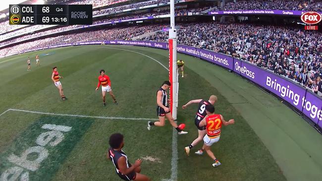 Did it cross the line before Brayden Maynard touched it? Picture: Fox Footy