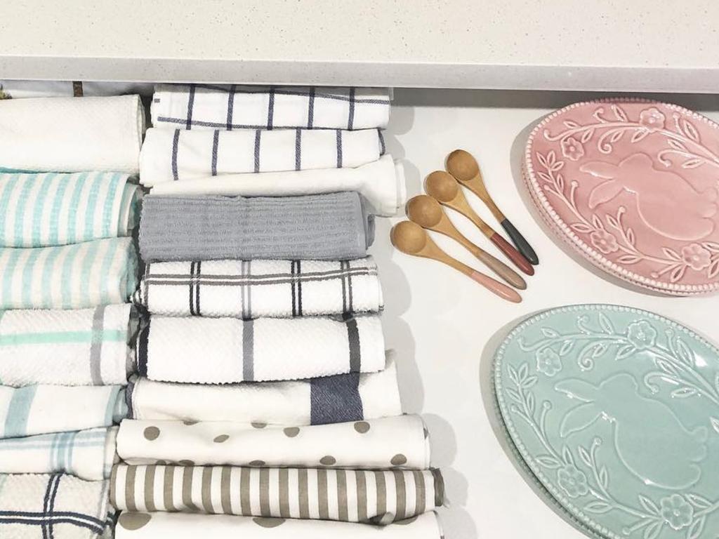 Even her tea towel cupboard is neat and tidy. Picture: Instagram/@sonyameares