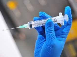 Needle and syringe held by gloved at Nambour General Hospital. Photo: Iain Curry / Sunshine Coast Daily. Picture: Iain Curry