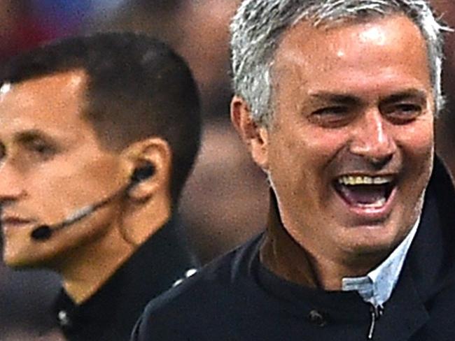 Chelsea's Portuguese manager Jose Mourinho (C) reacts after the referee didn't call for a penalty during a UEFA Chamions league group stage football match between Chelsea and Dynamo Kiev at Stamford Bridge stadium in west London on November 4, 2015. AFP PHOTO / BEN STANSALL