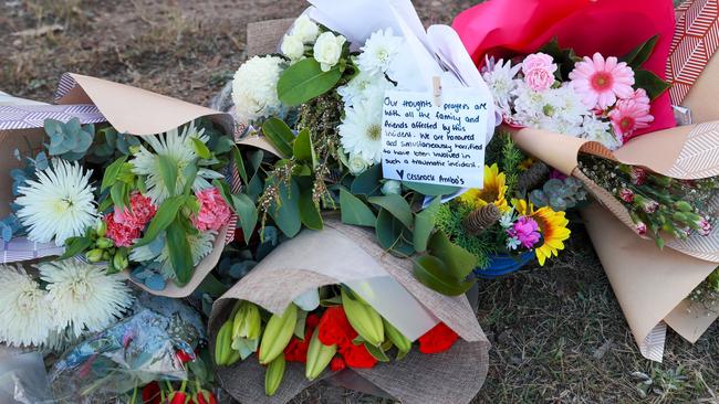 Tributes and flowers now lay at the scene of the crash. Picture: Roni Bintang/Getty Images