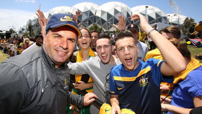 Fans with the Aussie Socceroo players at Olympic Park. National coach Ange Postecoglou with fans. Picture: Stuart Milligan