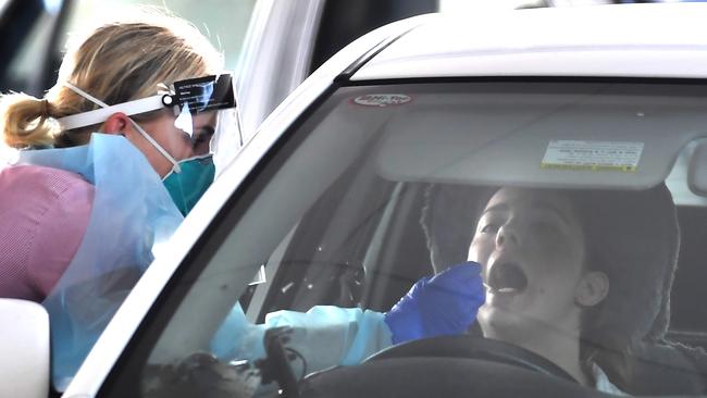 People getting COVID testing at the car collection centre in Bowen Hills, Queensland. Picture: NCA NewsWire / John Gass