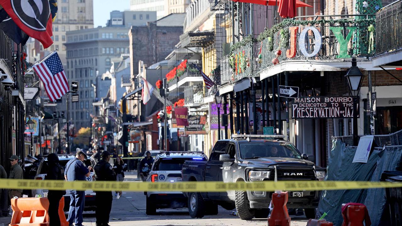 Law enforcement officers from multiple agencies work the scene on Bourbon Street. Picture: Michael DeMocker / GETTY IMAGES NORTH AMERICA / Getty Images via AFP