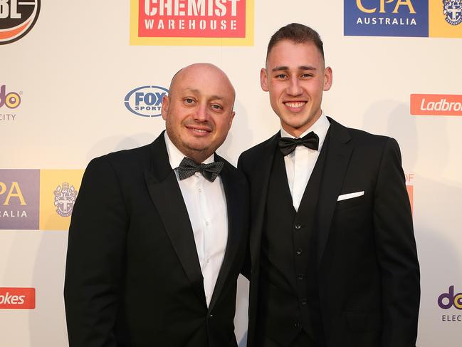 Larry Kestelman with son Justin at the NBL MVP awards night. Picture: Julie Kiriacoudis