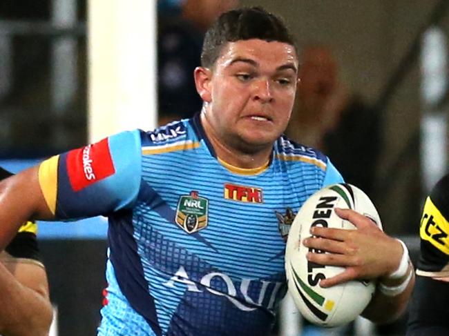 Ashley Taylor of the Gold Coast Titans breaks into the Penrith Panthers half during their NRL game played at the Cibus Super stadium, Robina, Gold Coast. Photo: Regi Varghese