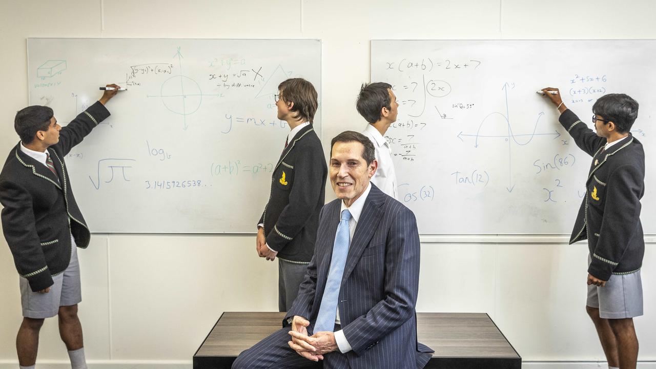 Melbourne High School principal Anthony Mordini with students inside a maths classroom. Picture: Jake Nowakowski