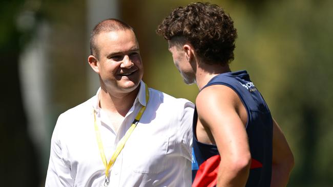 MELBOURNE, AUSTRALIA - NOVEMBER 22: Brad Green the President of the Demons chats with Harvey Langford of the Demons during a Melbourne Demons AFL training session at Gosch's Paddock on November 22, 2024 in Melbourne, Australia.  (Photo by Quinn Rooney/Getty Images)